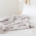 PATTERNED FAUX FUR THROW BLANKETS